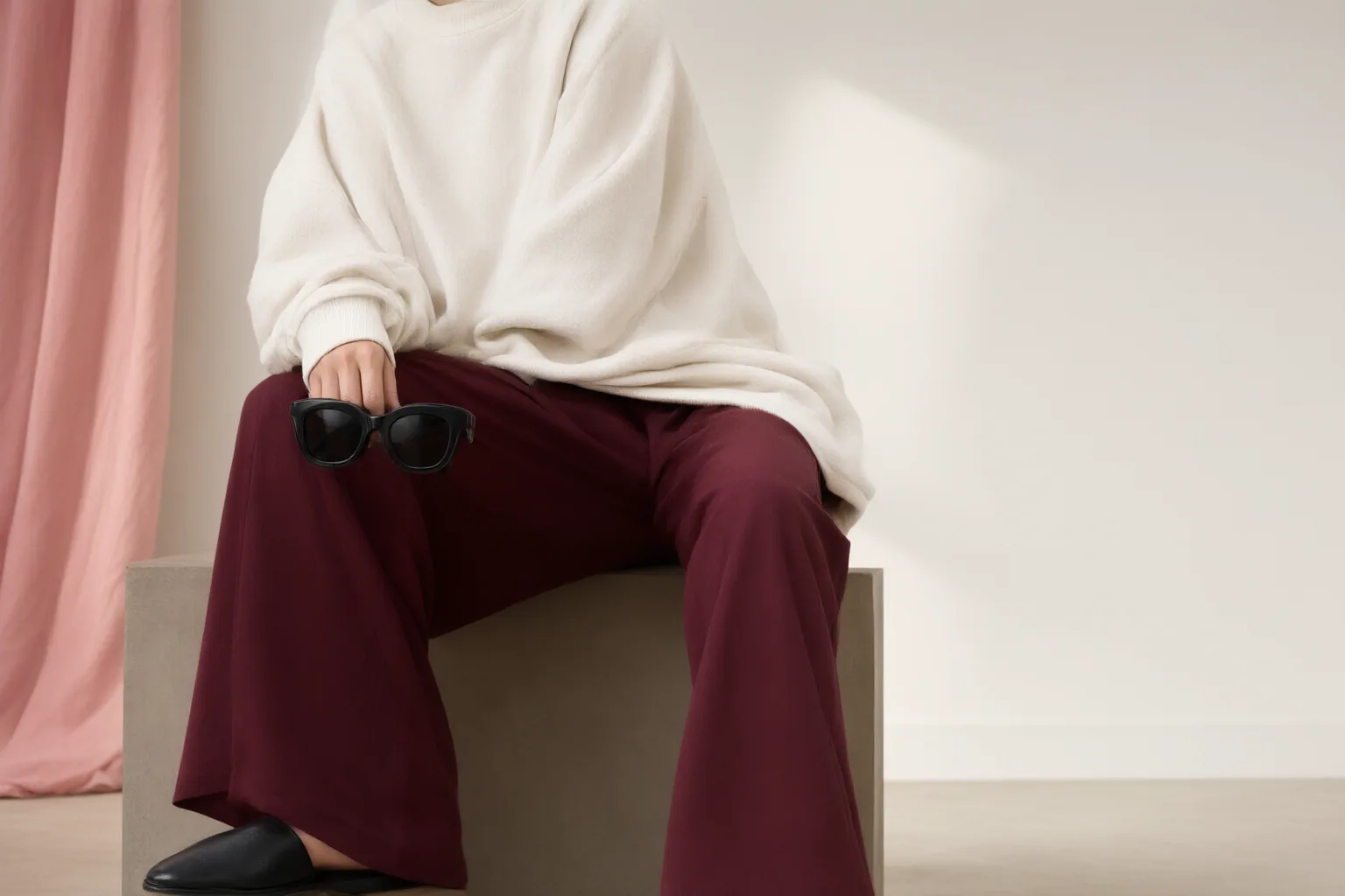 Original editorial hero image for How to Recreate Khloé Kardashian’s Oversized Sweatshirt and Sunglasses Look